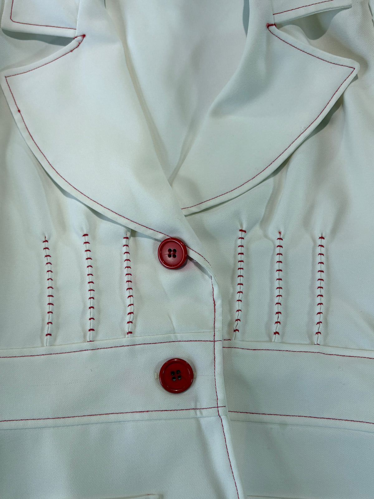 ivory white tailored blazer with red buttons
